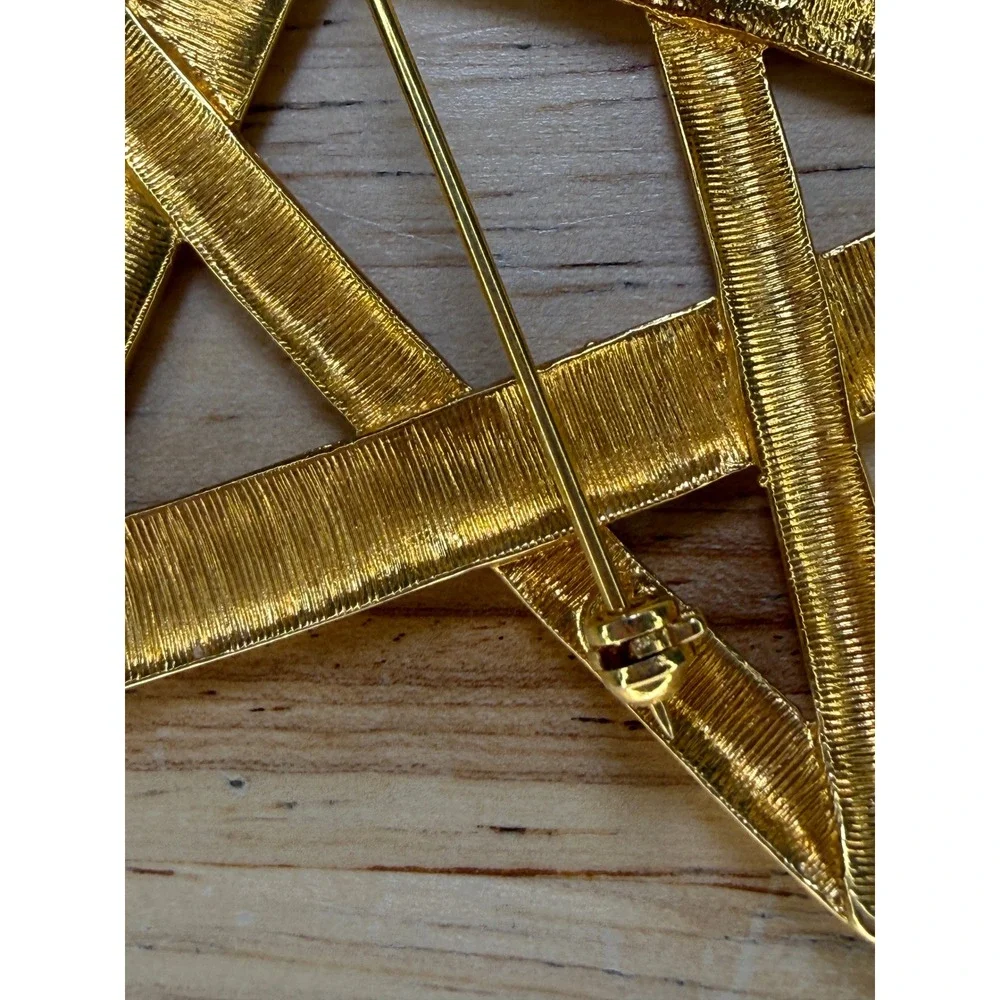 Yves Saint Laurent type brooch